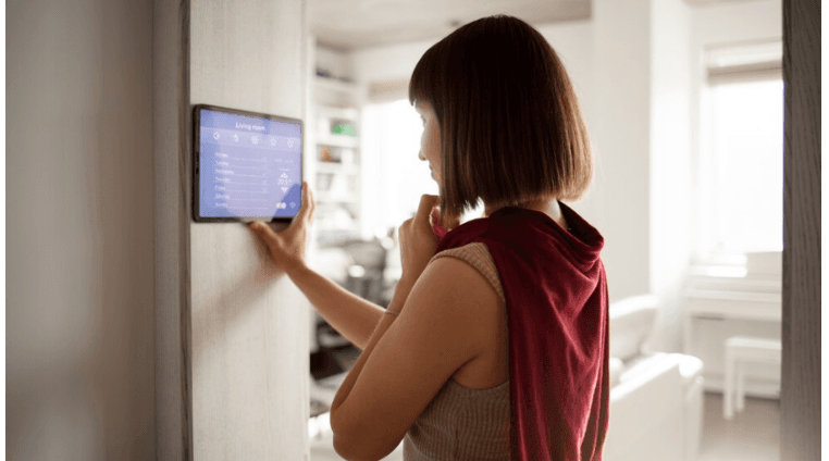 Women using home security system